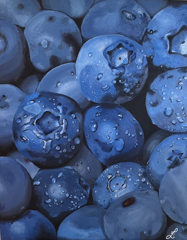 An enlarged photo of fresh blueberries.