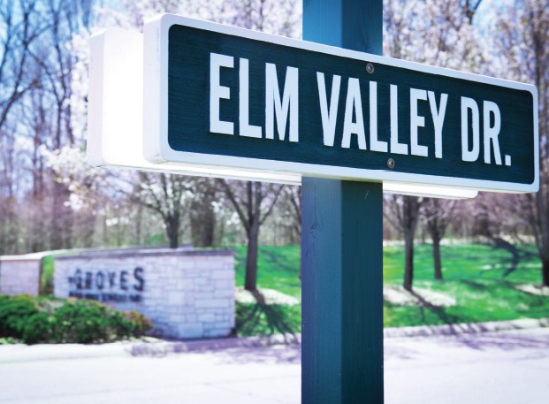 Elm Valley Drive Street Sign in front of the Groves Entrance