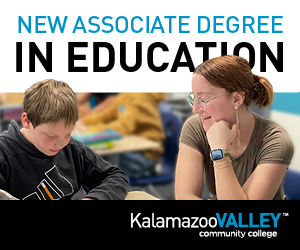 A photograph of a teen or pre-teen child in a classroom and focusing on work on the desk. Sitting next to the child is a woman in glasses smiling and resting her hand on her fist. Text over the image reads: New Associate Degree in Education. Kalamazoo Valley Community College.